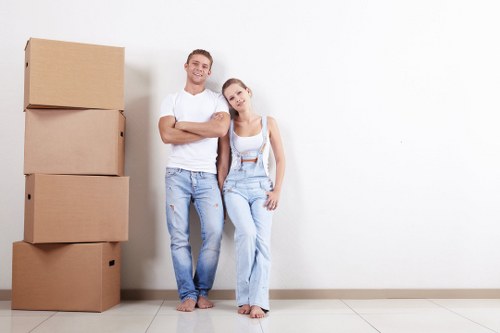 Local removals team loading a van for a home move in To