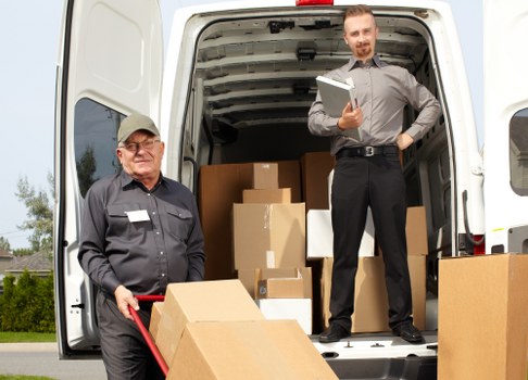 Commercial moving team planning a business relocation in To