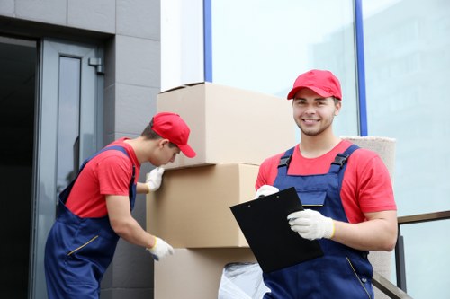Prepared household boxes and furniture ready for removals in To