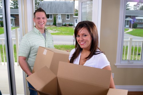 Packaged furniture and labeled boxes ready for transport