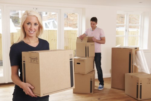 Professional movers helping with a local home relocation in To