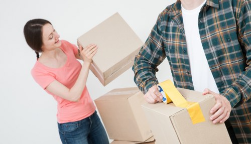 Loading furniture into a van for a move in To