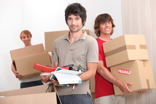 Local office relocation process with labelled boxes and equipment