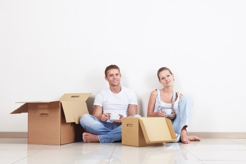 Local van service handling a residential delivery in To