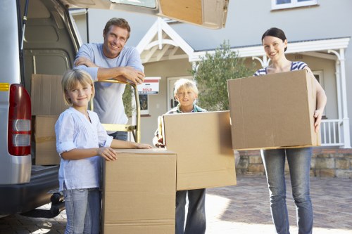 Packed boxes and furniture ready for transport during a house removal