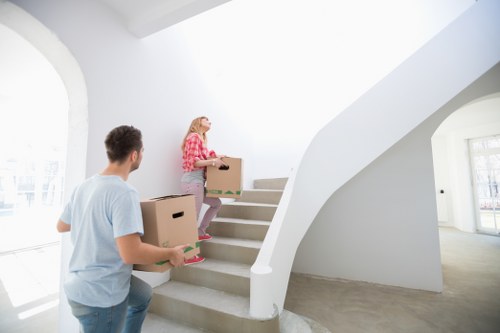 Unloading office furniture and stock at a commercial premises in To