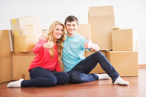 Local crew collecting bulky furniture from a property with limited parking